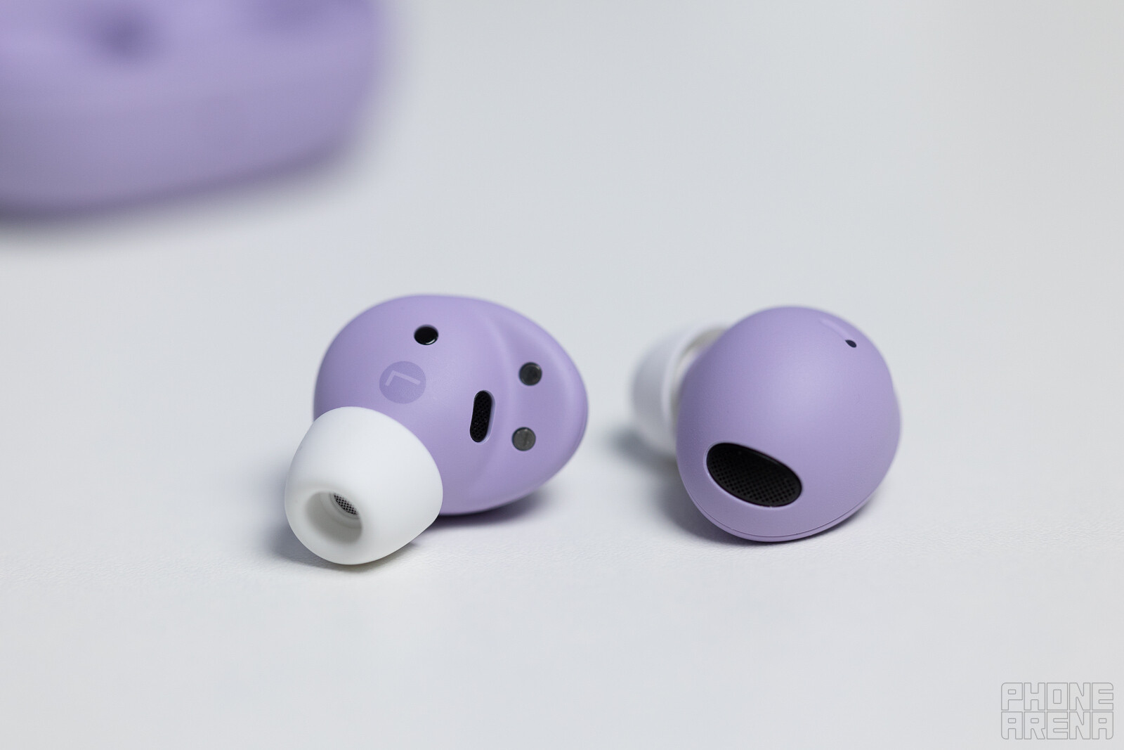 (Image credit - PhoneArena) Galaxy Buds 2 Pro earbuds, close up - Galaxy Buds 2 Pro review: Sleeker design, but is it worth the price jump?